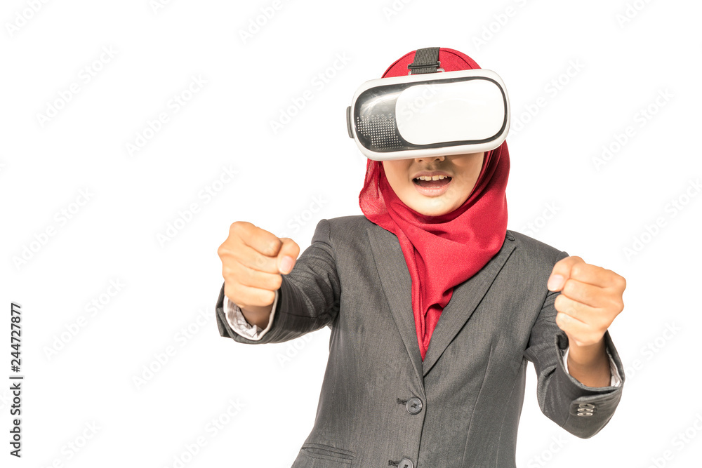 Veiled businesswoman wearing vr (Virtual Reality) box with white background. Technology conceptual. Veiled businesswoman wearing vr (Virtual Reality) box with white background. Technology conceptual.