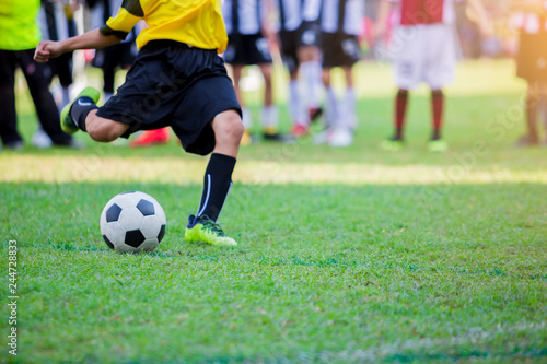 Kid soccer player do penalty shootout