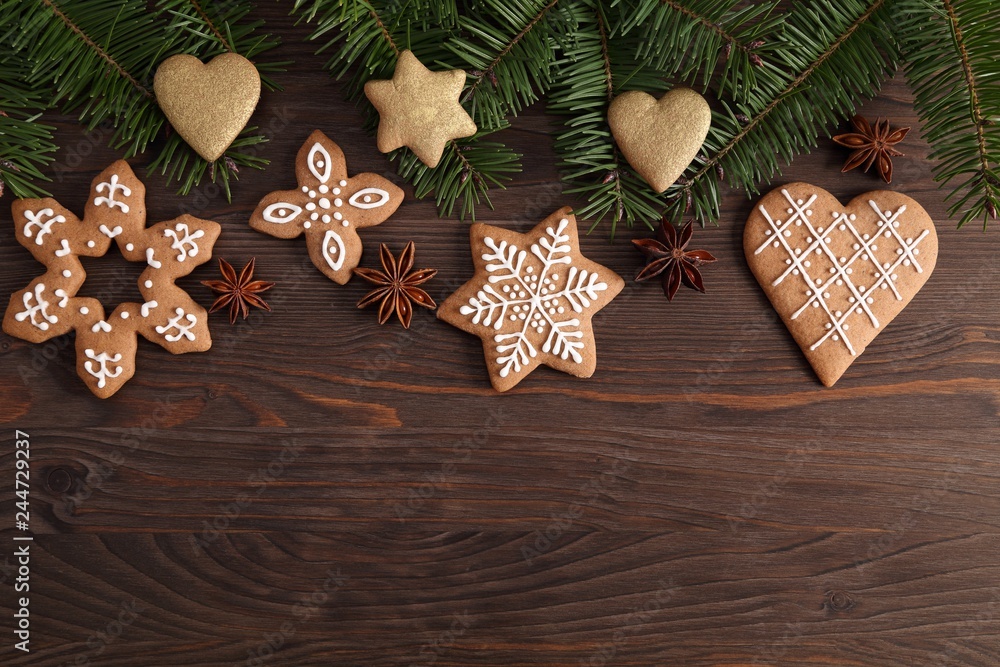 Homemade gingerbread cookies on a dark background. Sweet food.