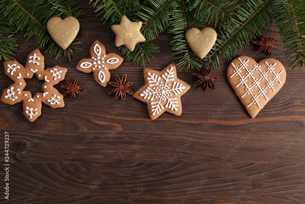 Homemade gingerbread cookies on a dark background. Sweet food. Homemade gingerbread cookies on a dark background. Sweet food.