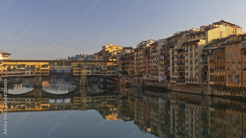 Florence, Italy. Morning panoramic view of Ponte Vecchio bridge and the Arno River from the Ponte Santa Trinita (Holy Trinity Bridge) in Florence, Tuscany, Italy. 4K, UHD Florence, Italy. Morning panoramic view of Ponte Vecchio bridge and the Arno River from the Ponte Santa Trinita (Holy Trinity Bridge) in Florence, Tuscany, Italy. 4K, UHD