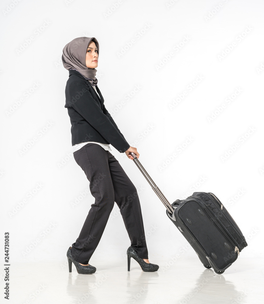 young teenager walking and carrying bag. young teenager walking and carrying bag.