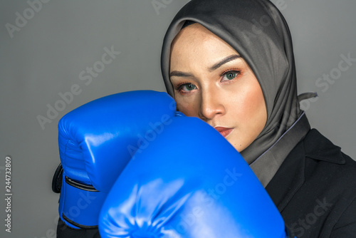 Muslimah fighter with low light view.