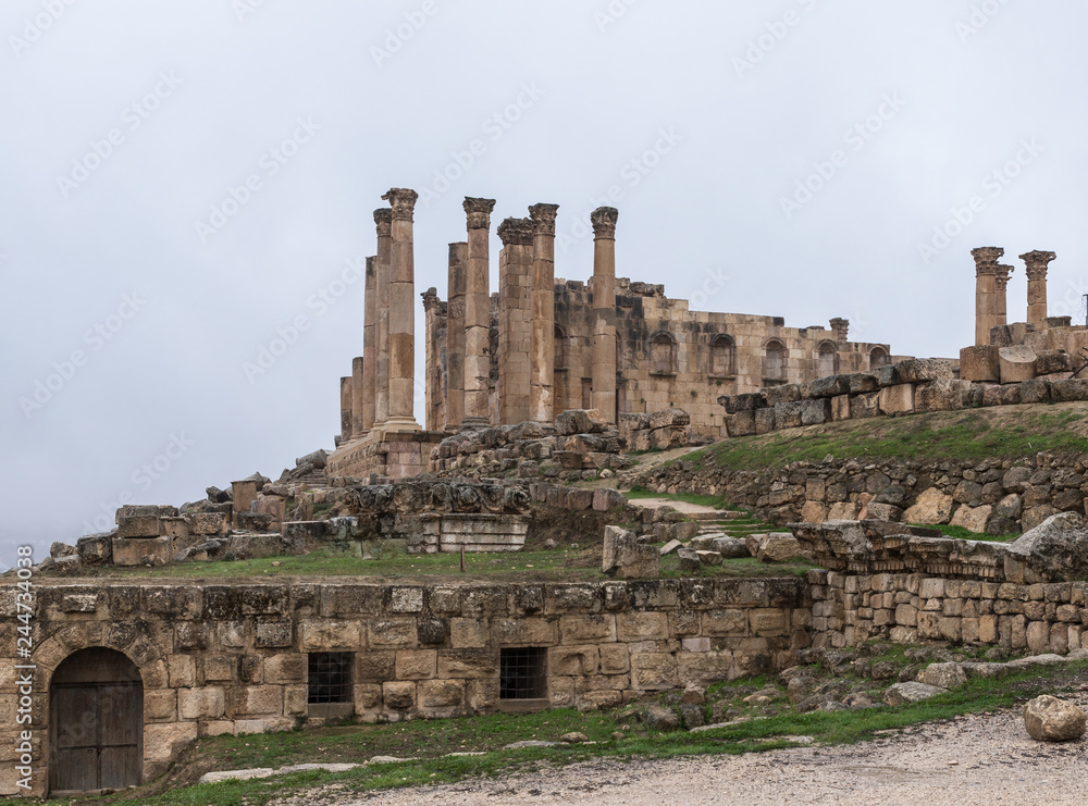 The ruins of Temple of Zeus in the great Roman city of Jerash - Gerasa, destroyed by an earthquake in 749 AD, located in Jerash city in Jordan