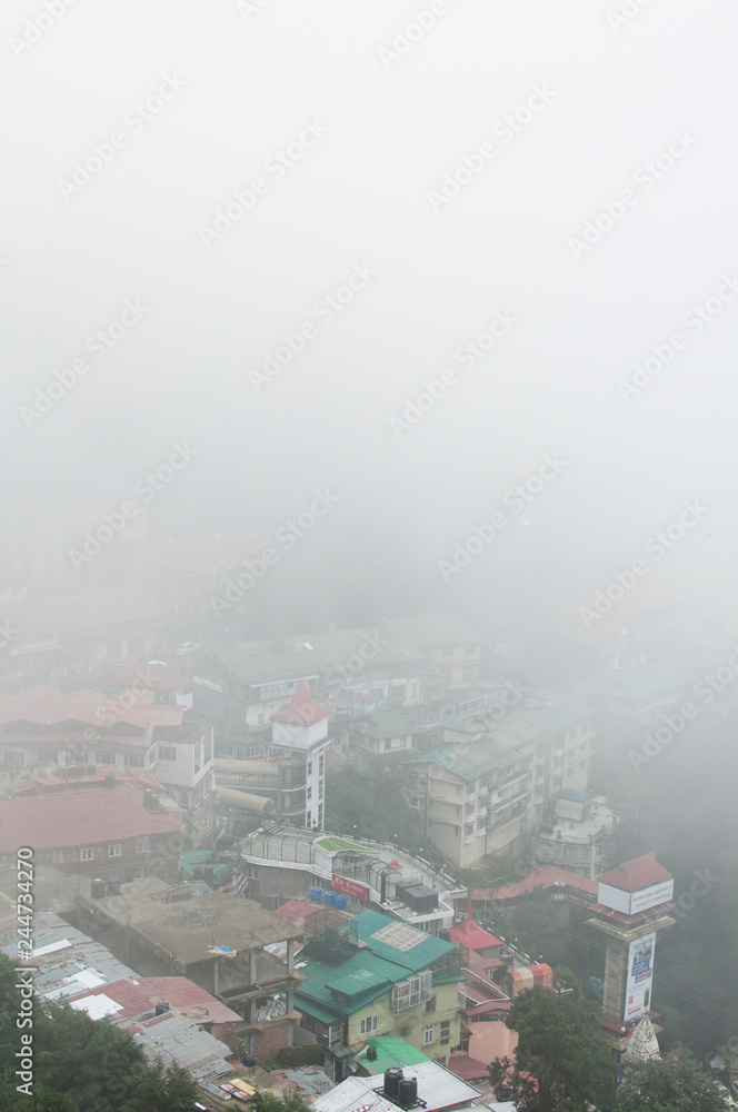 Shimla, Himachal Pradesh / India - August 05 2011: View over the city of Shimla, a hillstation in Northern India.