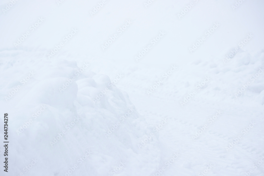 Winter landscape with snowfall and snowdrifts. snow removal in Gatchina Park