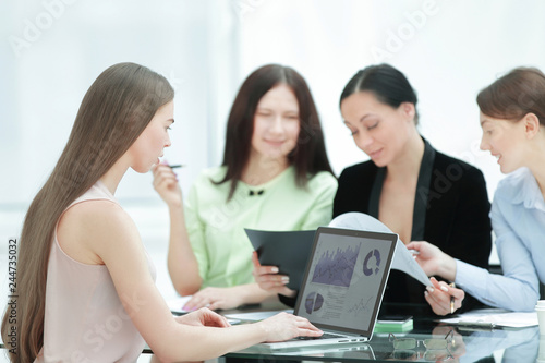 business team discussing a financial report at the office