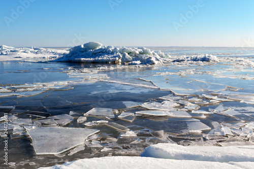 Melting ice hummocks on the Baltic Sea