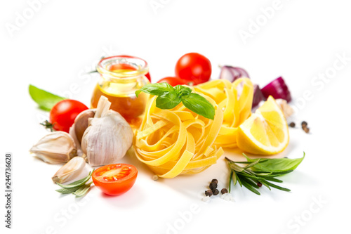 Italian cuisine concept - raw pasta and ingredients. Healthy vegetarian diet, isolated on white