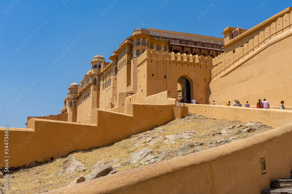 Jaipur, Rajasthan, India - April 23, 2018 :Beautiful view of Amber fort and Amber palace with its large ramparts and series of gates and cobbled paths, Constructed of red sandstone and marble.