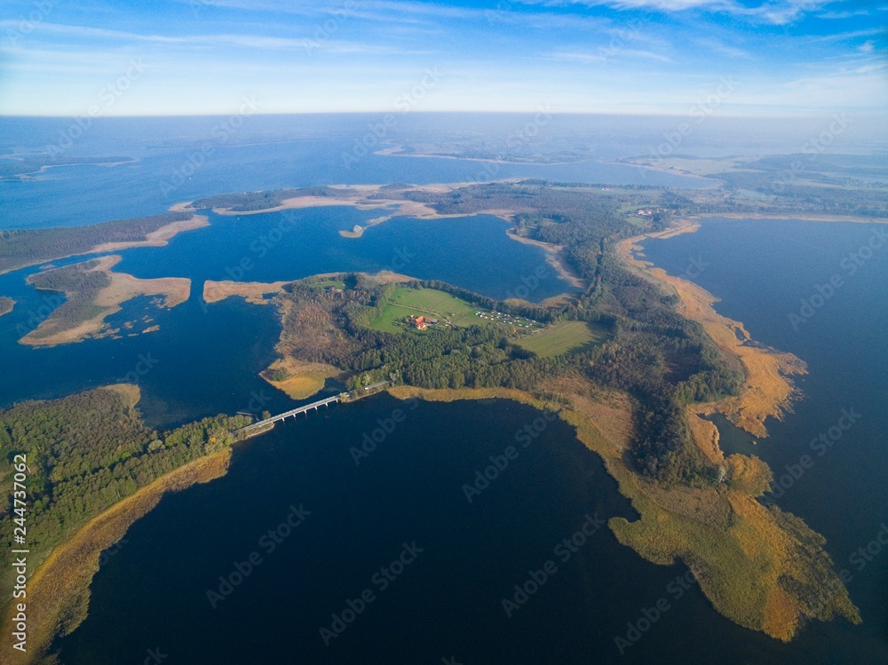 Aerial view of beautiful landscape of lake district, bridge between Dargin and Kirsajty Lakes, next Mamry Lake, Mazury, Poland