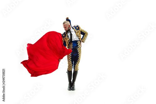 Schilderij op canvas Torero in blue and gold suit or typical spanish bullfighter isolated over white studio background