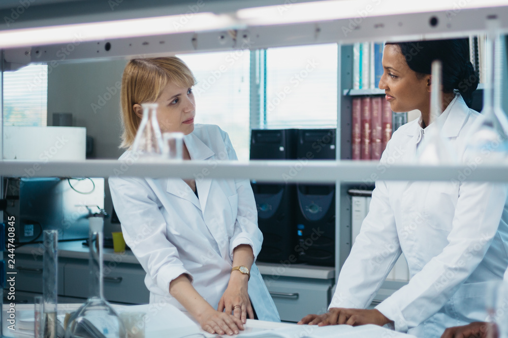 Young scientists working in a lab Young scientists working in a lab