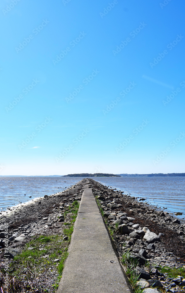 Stone pier in the sea in Sweden