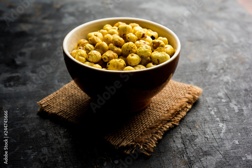 Roasted Phool Makhana or Crispy Lotus pops Seed served in a bowl, selective focus photo