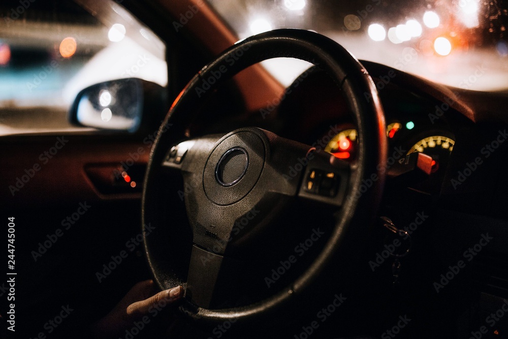  interior of a modern car at night. concept of driving at night.