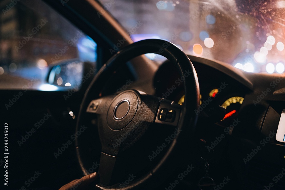  interior of a modern car at night. concept of driving at night.