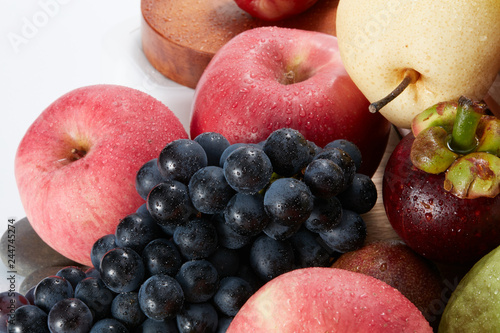 Closeup, a wide variety of fruits background 