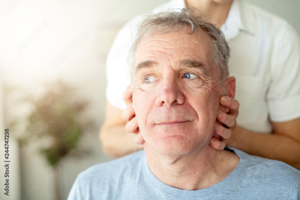 A Modern rehabilitation physiotherapy worker with senior client A Modern rehabilitation physiotherapy worker with senior client