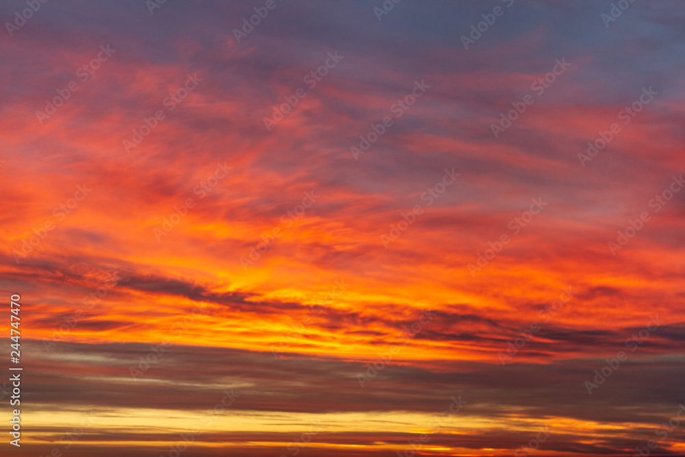 Awesome, incredible beautiful red, pink vivid sunset landscape. Sunset sky texture and background. Beauty nature
