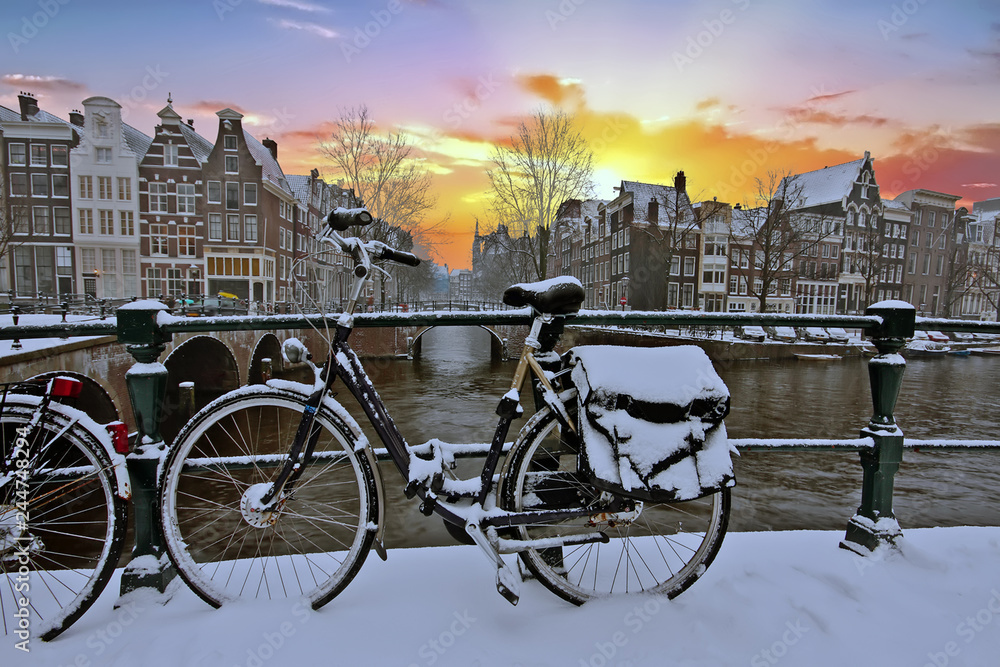 City scenic from snowy Amsterdam in the Netherlands in winter