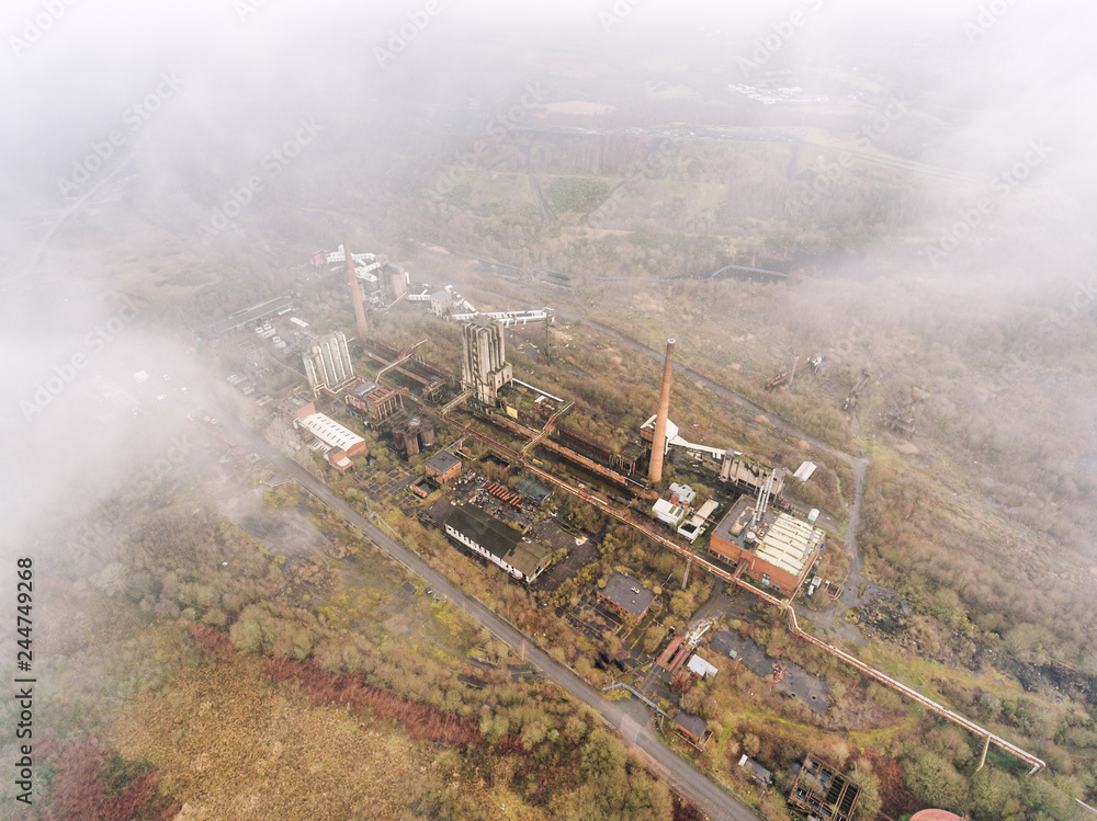 Aerial view of the derelict buildings of the former Cwm colliery and coking works at Beddau near Pontypridd, Wales