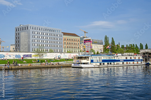 Photography Banks of the river Spree with the East Side Gallery, Eastern Comfort Hostel Boat
