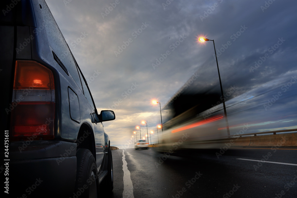 Speed motion of cars ,selective focus and long shutter speed exposure.Transportation concept. Speed motion of cars ,selective focus and long shutter speed exposure.Transportation concept.