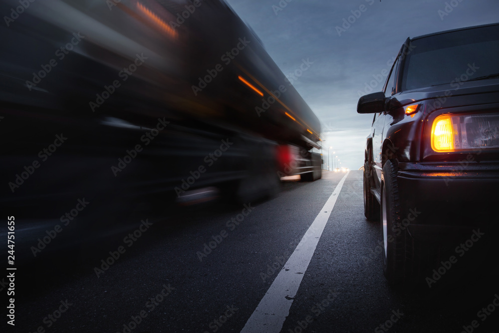 Speed motion of cars ,selective focus and long shutter speed exposure.Transportation concept. Speed motion of cars ,selective focus and long shutter speed exposure.Transportation concept.