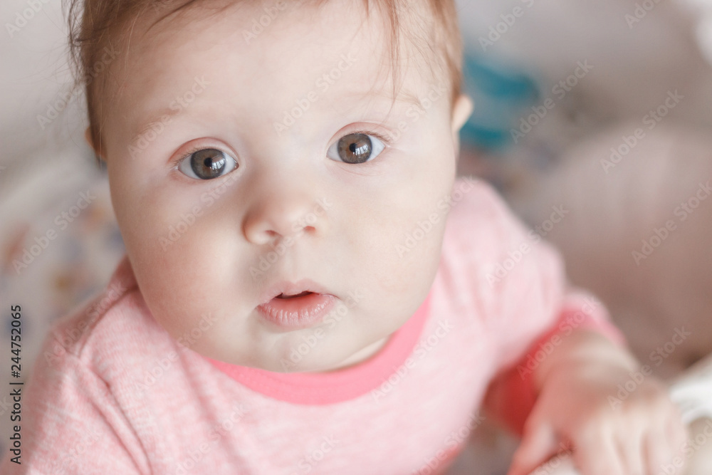 Portrait of joyfil, happiness baby in the bedroom, blurred background Portrait of joyfil, happiness baby in the bedroom, blurred background