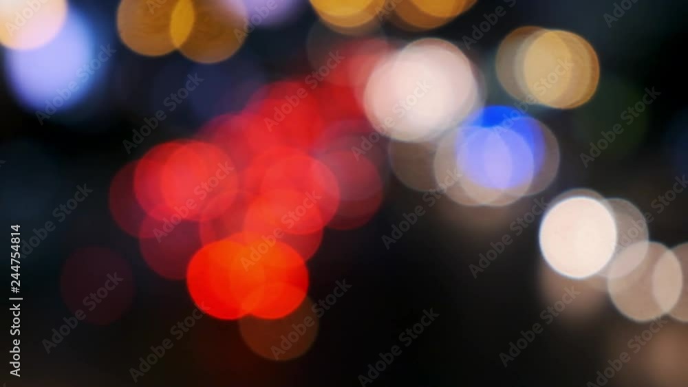 Slow motion moving bokeh lights background, night traffic