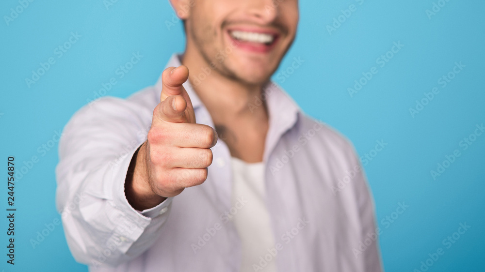 Man pointing forefinger at camera, crop, closeup Man pointing forefinger at camera, crop, closeup