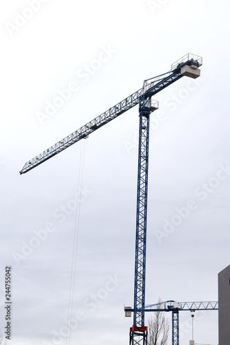 blue crane working on the construction site