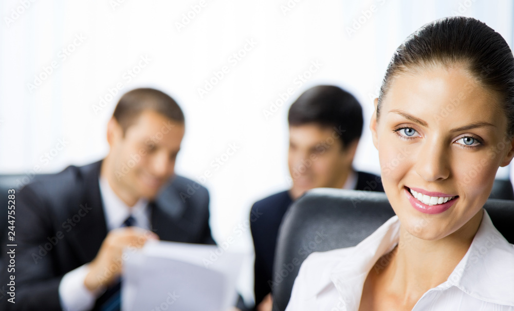 Portrait of happy smiling businesswoman at office Portrait of happy smiling businesswoman at office
