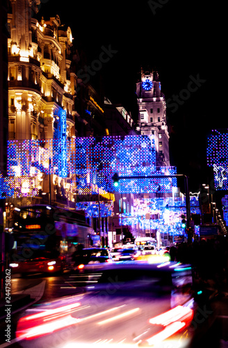 Landscape of Madrid streets at night including moved lights