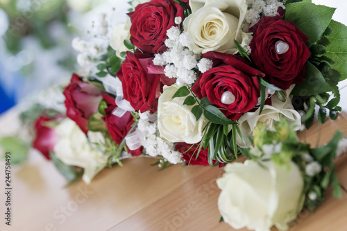 Beautiful bouquet of white and red roses for wedding