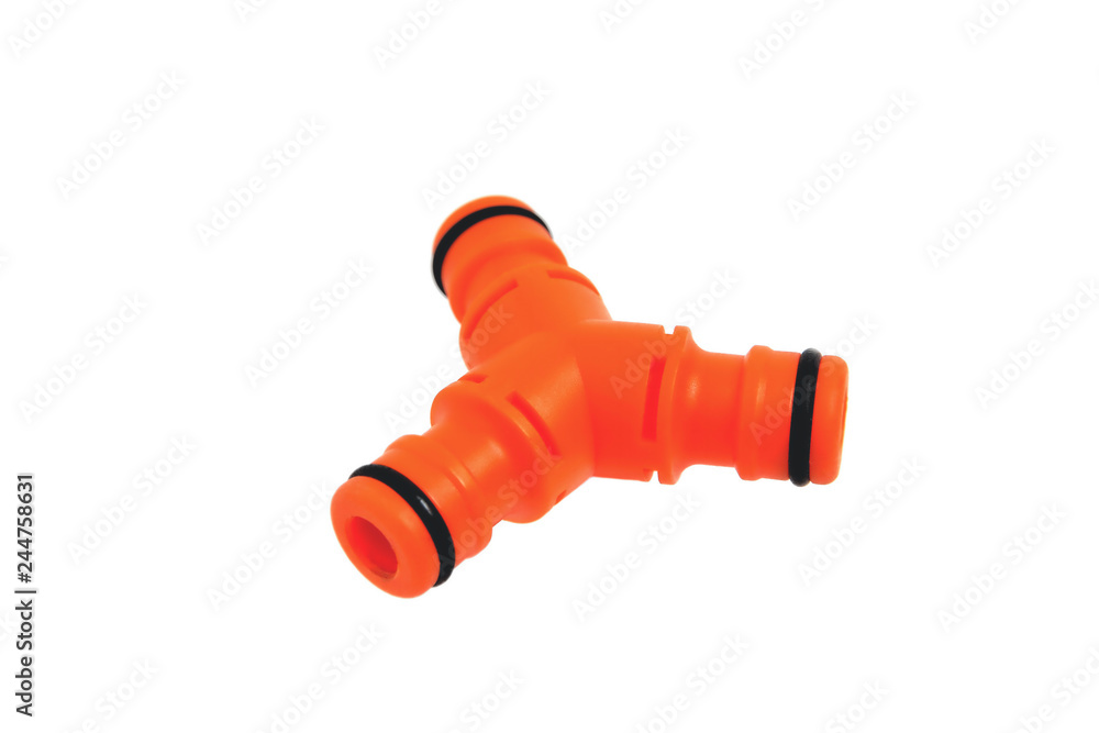 Triple adapter for watering hoses, white background close-up Triple adapter for watering hoses, white background close-up