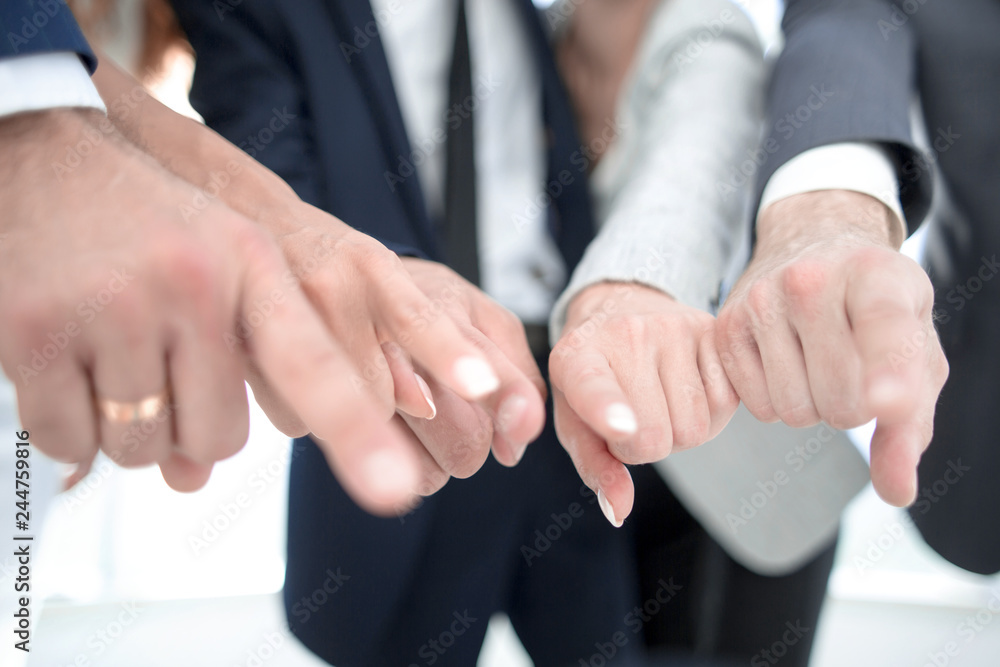 close up.a group of business youth pointing at you close up.a group of business youth pointing at you