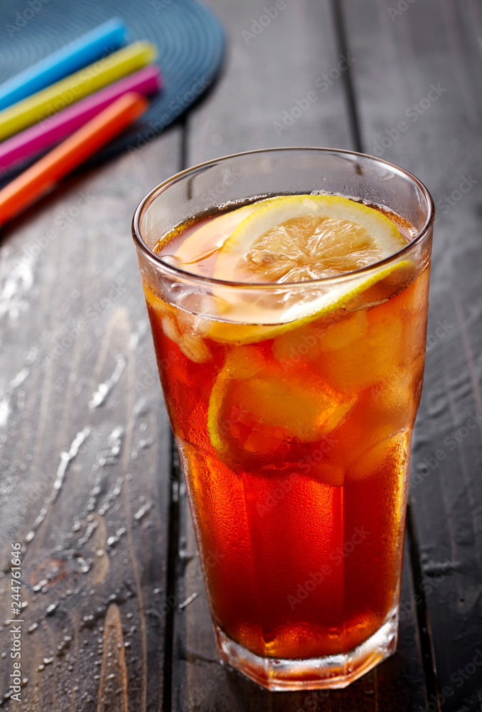 Frozen lemon tea on wooden table Frozen lemon tea on wooden table