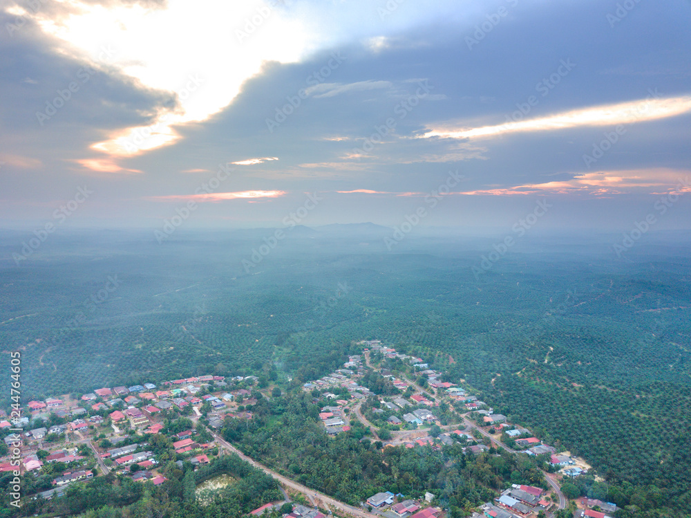 Aerial view of countryside with sunset background. Aerial view of countryside with sunset background.