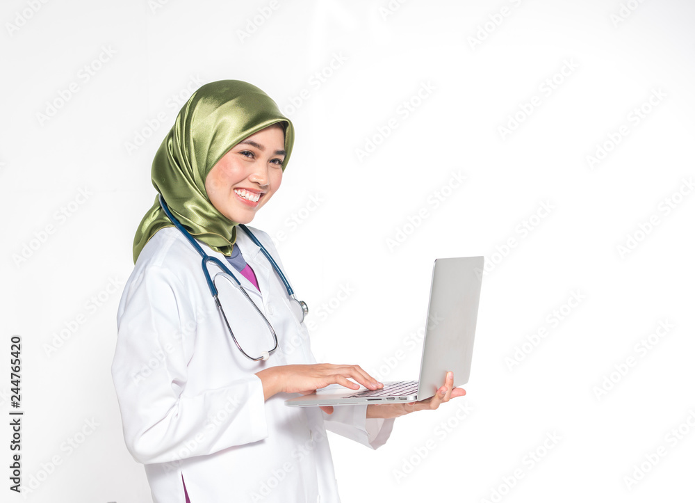 Veiled teenager muslimah with medical concept. Veiled teenager muslimah with medical concept.