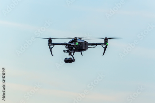 Big professional quadcopter in the sky