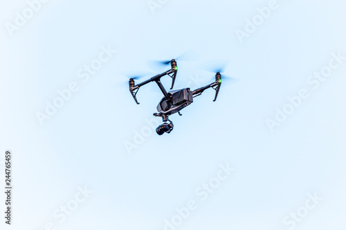 Big professional quadcopter in the sky