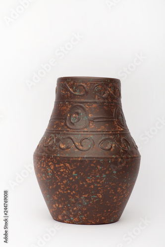 Old brown vase  on the white background photo