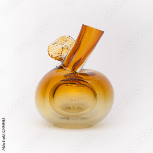 Old brown yellow glass vase  on the white background photo