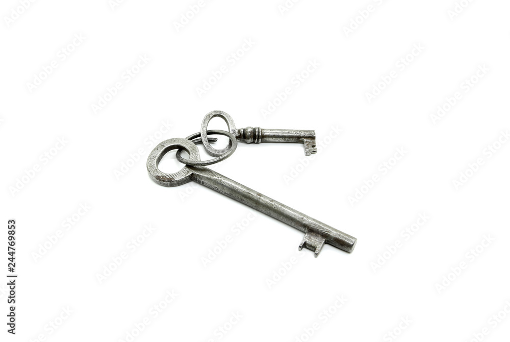 Two very old keys isolated on white background Two very old keys isolated on white background