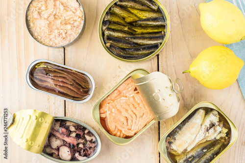 Varieties of canned fish. photo