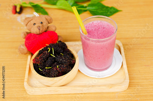 Fresh Mulberry juice drinks homemade on wood backgrounds