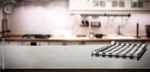 Table background of free space with napkin decoration and kitchen background 