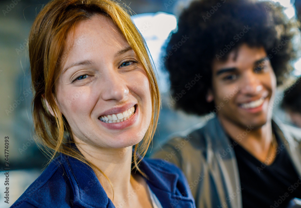 Afro american man and red hair caucasian woman smiling at bar.Multiethnic people having break time in restaurant lounge.Corporate,diversity and social concepts. Afro american man and red hair caucasian woman smiling at bar.Multiethnic people having break time in restaurant lounge.Corporate,diversity and social concepts.